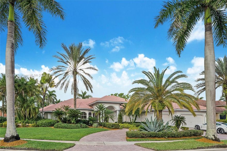 Magnificent one story estate in the most sought after private community of "Princeton" within The Weston Hills Country Club. Completely renovated with large windows in every room that provide incredible natural lighting throughout. Grand living room with wet bar, spectacular master suite with sitting area & deluxe bath, large gourmet kitchen with breakfast area. Every bedroom is a private suite with it own full bathroom. All on a large 1/2 acre corner lot with a tropical heated pool and garden paradise with resort style spacious patio areas. The ultimate in Florida living.