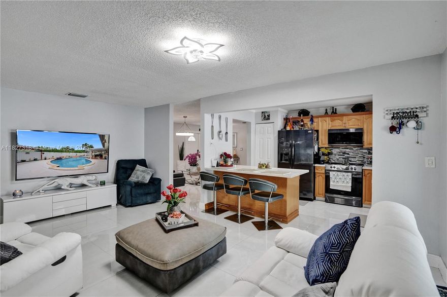 Welcome to 31 NW 133rd Pl, a spacious and versatile 6-bedroom, 3-bathroom home with nearly 2,300 sq ft of living space, perfect for large families or those seeking extra room for guests, a home office, or rental income. Located in the heart of Tamiami, this single-story property features formal living and dining areas, a cozy family room, and a kitchen that opens to a private backyard oasis with a sparkling pool and covered patio—ideal for entertaining. Recent upgrades include a newer AC, tankless water heater. Nestled in a quiet, family-friendly neighborhood just minutes from top-rated schools, FIU, Dolphin Mall, and major highways, this move-in-ready home offers the perfect blend of comfort, functionality, and location.