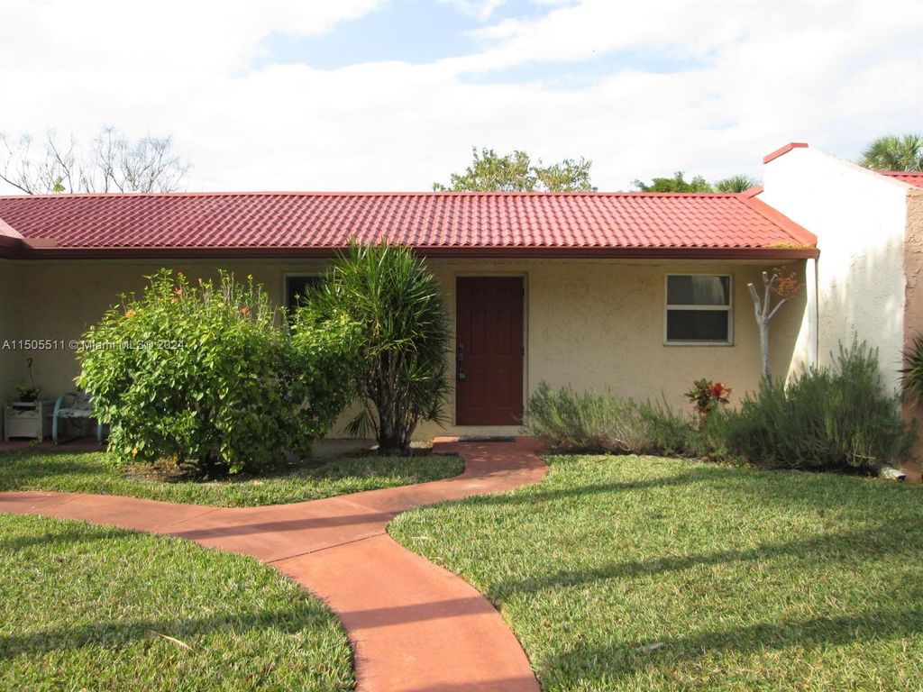 Photo of 117 Lake Carol Dr #1, West Palm Beach, FL 33411 (MLS # A11505511)