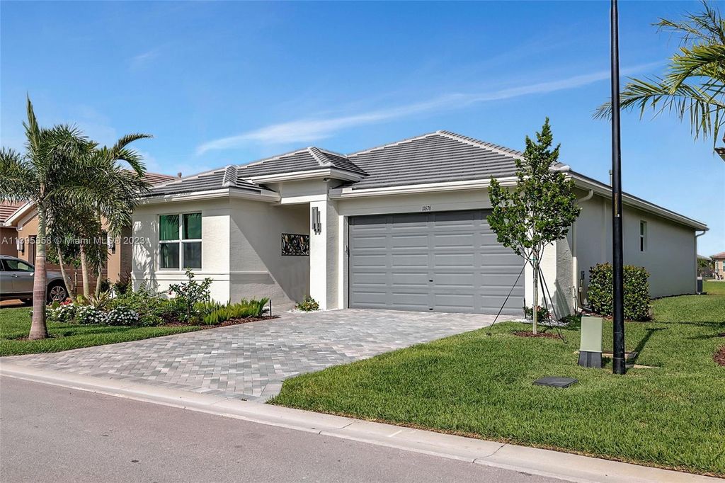 Photo of 11676 SW River Crossing Pl, Port Saint Lucie, FL 34987 (MLS # A11395358)