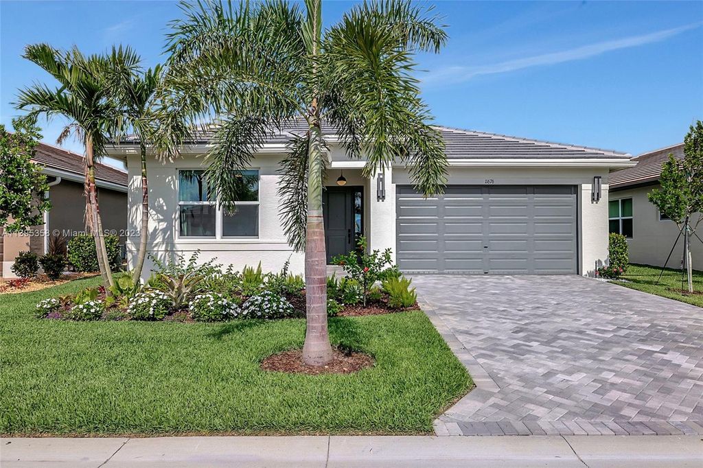 Photo of 11676 SW River Crossing Pl, Port Saint Lucie, FL 34987 (MLS # A11395358)