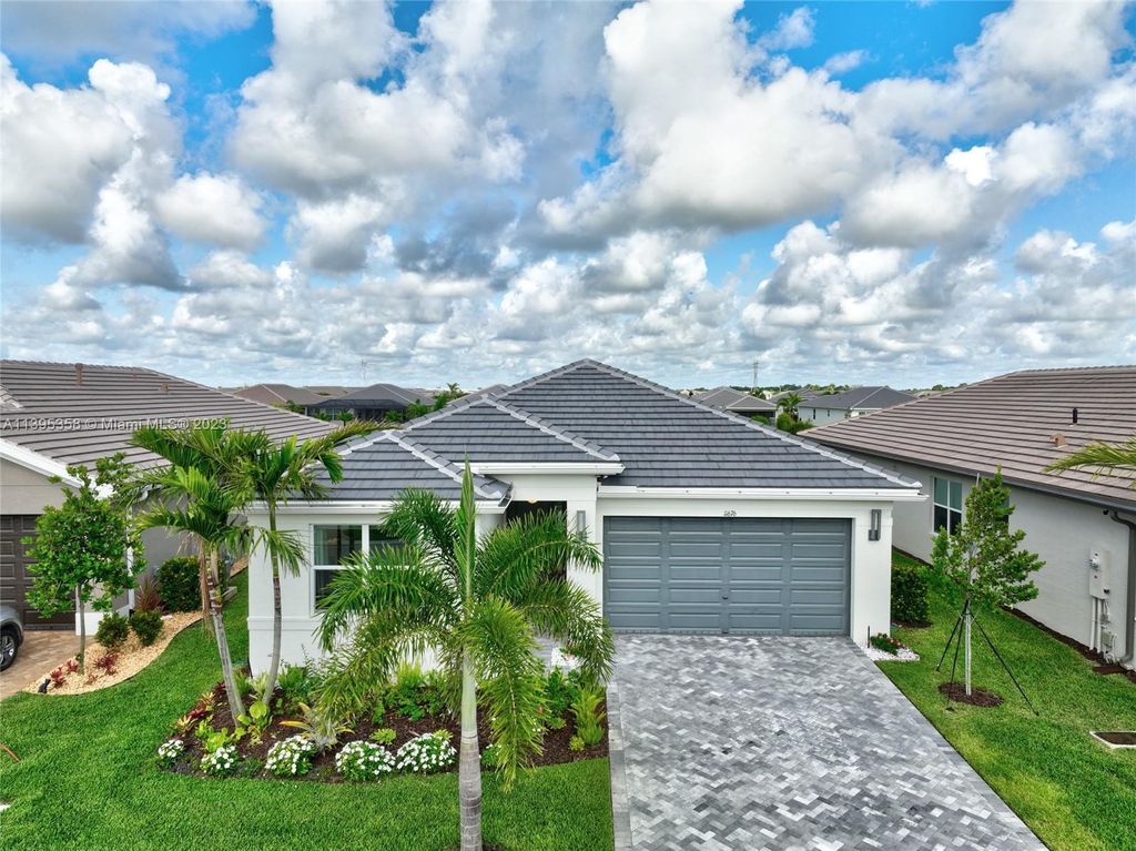 Photo of 11676 SW River Crossing Pl, Port Saint Lucie, FL 34987 (MLS # A11395358)