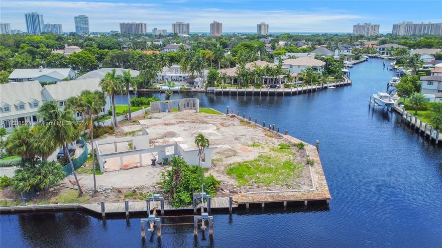 NEW PRICE! 50% Seller Financing Available. Do you want what nobody else has? RARE opportunity to own the crown jewel of Bay Colony! How about a private Mega-Mansion with 450 ft of waterfront on your private island with room to park multiple yachts & cars! This spectacular 3-story masterpiece will be the envy of your celebrity neighbors with almost 14,000 sft, 2 pools and a 3rd level that features a party room, rooftop pool & sport courts. Send your kids to Pinecrest School.  Positioned right at the apex of intersecting canals gives you plenty of room to park and turn your vessels. Sick of Lauderdale traffic? This private enclave is quiet and only 15 mins to the Lighthouse Pt inlet. Boaters & fishermen's dream come true!! Plans are included in the price. Reduced $1 million!!