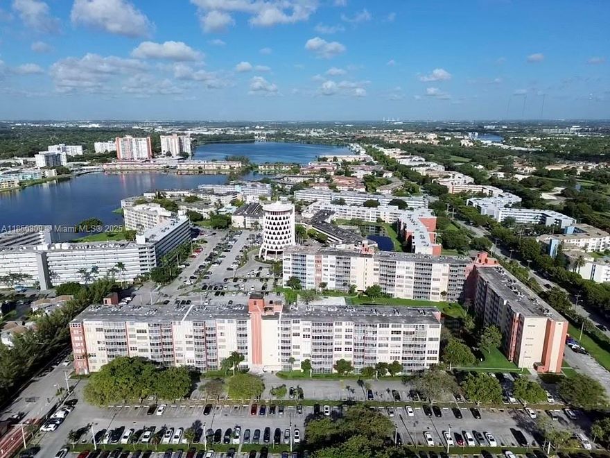Step into luxury in this fully renovated and oversized 2-bedroom, 2-baths condo with high ceilings, abundant natural light, and elegant finishes throughout. The spacious open layout flows seamlessly into a stunning walkthrough shower, designer lighting, and premium flooring. Enjoy beautiful views of the iconic Coppertone sign, the shimmering pool, and a peaceful lake from your private balcony. Assigned parking included. Located in a gated community with excellent amenities. Easy access to Aventura, beaches, I-95, and more.