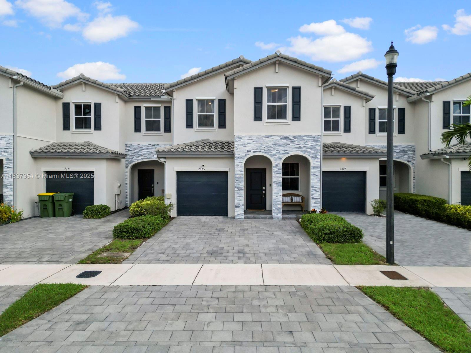 Welcome to this stunning immaculate townhouse, featuring 3 bedrooms and 2.5 bathrooms, 1 car garage in the highly sought-after "Riviera of Keys Gate" gated community. Spacious Kitchen with dark cabinets, for plenty storage and stainless steel appliances. Spacious dining/ living/ family room areas. Large master bedroom with huge built in -walk-in closet system. Master bathroom features large walk-in shower and a double-sink vanity. Newer washer and dryer appliances conveniently located upstairs.Low-maintenance paved and fully fenced backyard.Extended driveway for multiple cars to park. Low HOA-Community offers clubhouse, pool, fitness center, walking paths and more. Located minutes away from retail stores, schools, restaurants, Hospital & FL turnpike. Minutes away from the Florida Keys.