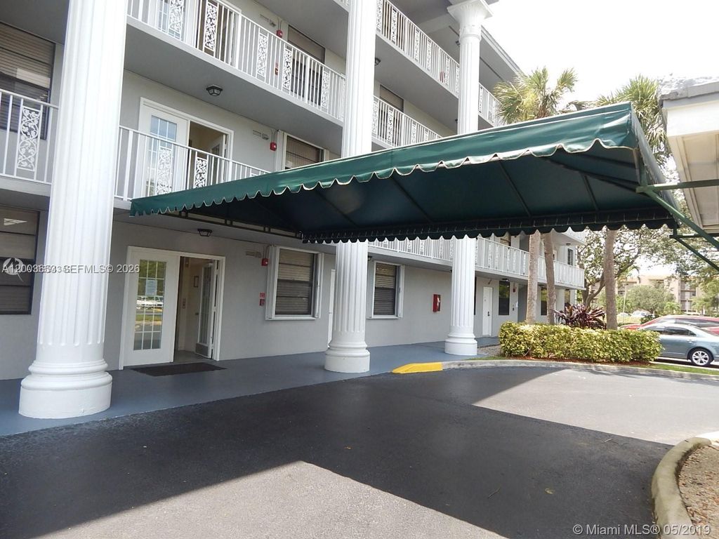 Photo of 1701 Whitehall Dr #403, Davie, FL 33324 (MLS # A12003653)