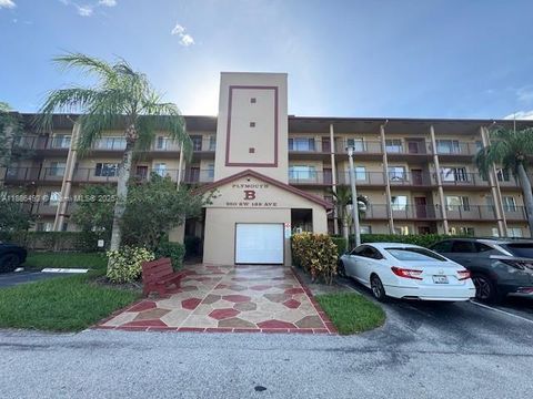 Photo of 950 SW 138th Ave #314B, Pembroke Pines, FL 33027 (MLS # A11886492)