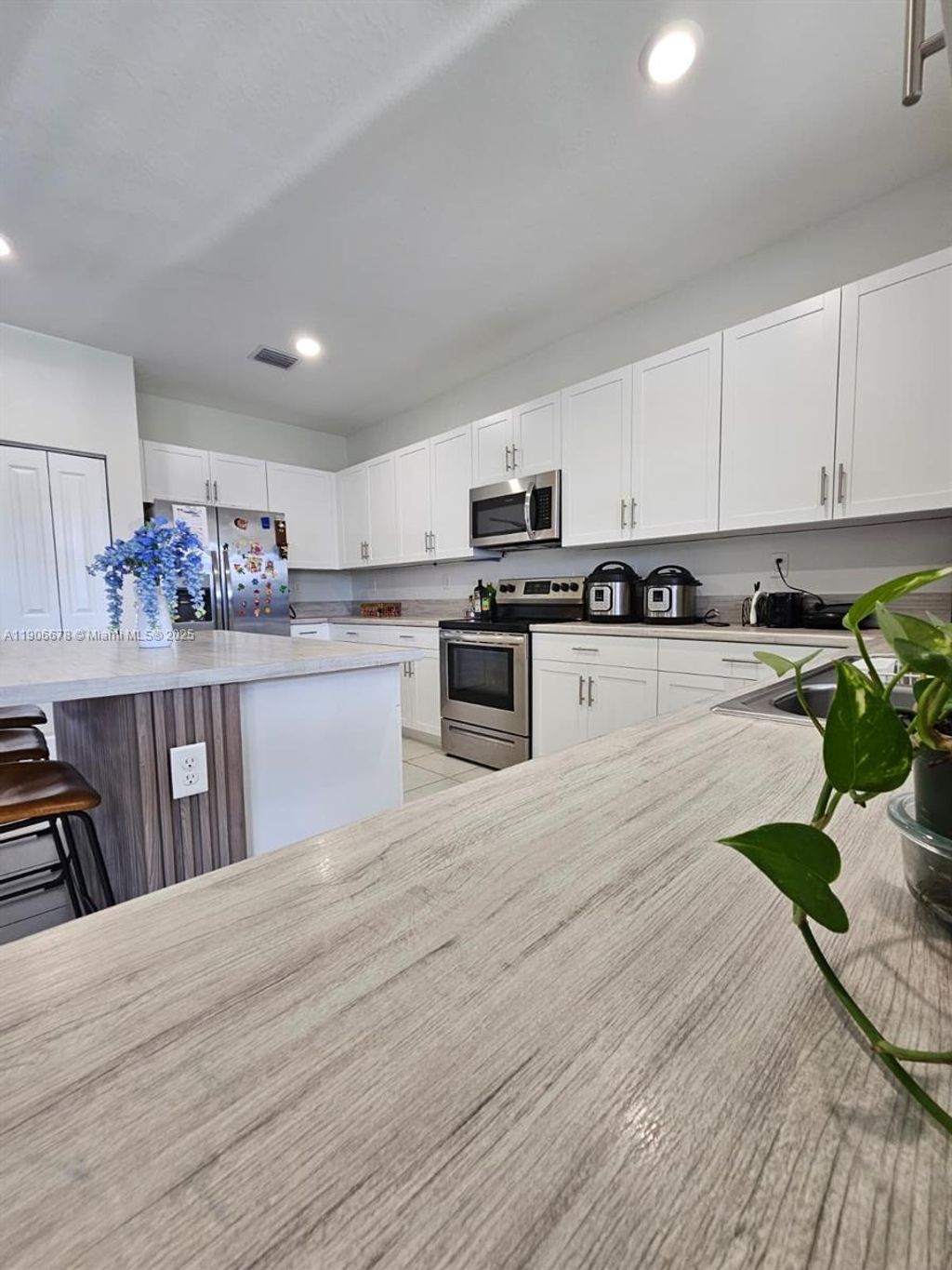 Photo of 12736 SW 215th Ter, Miami, FL 33177 (MLS # A11906678)