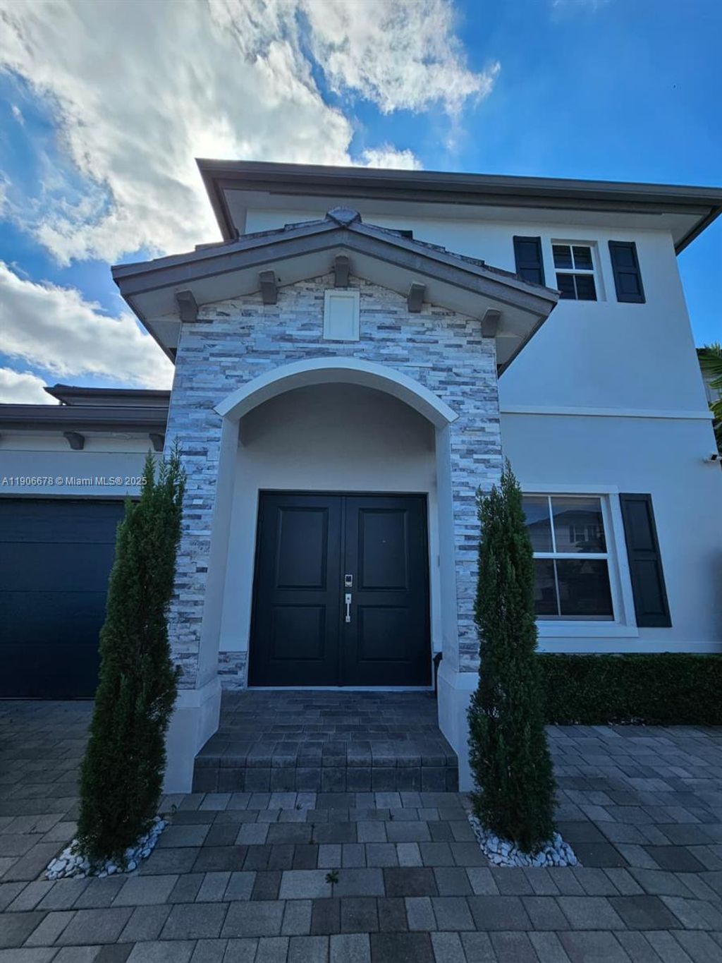 Photo of 12736 SW 215th Ter, Miami, FL 33177 (MLS # A11906678)