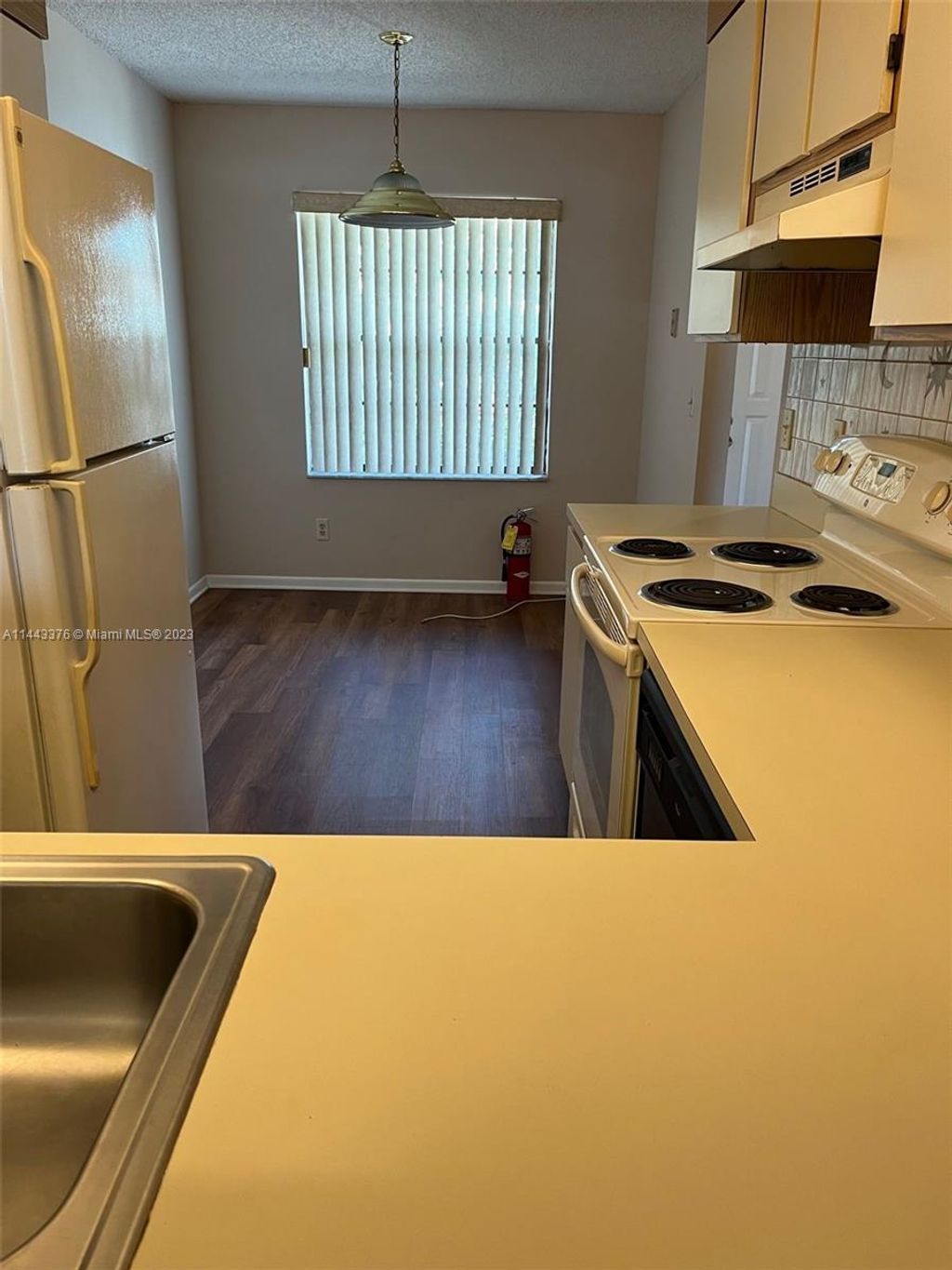 Photo of 801 Pinecrest Cir #E, Jupiter, FL 33458 (MLS # A11443376)