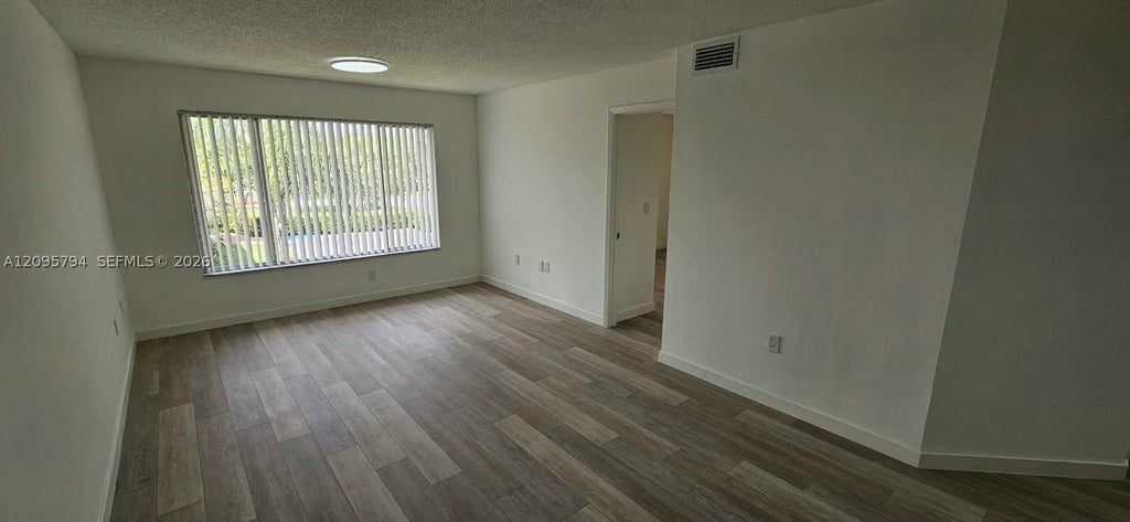 Photo of 3282 NW 103rd Ter #205-A, Coral Springs, FL 33065 (MLS # A12095794)