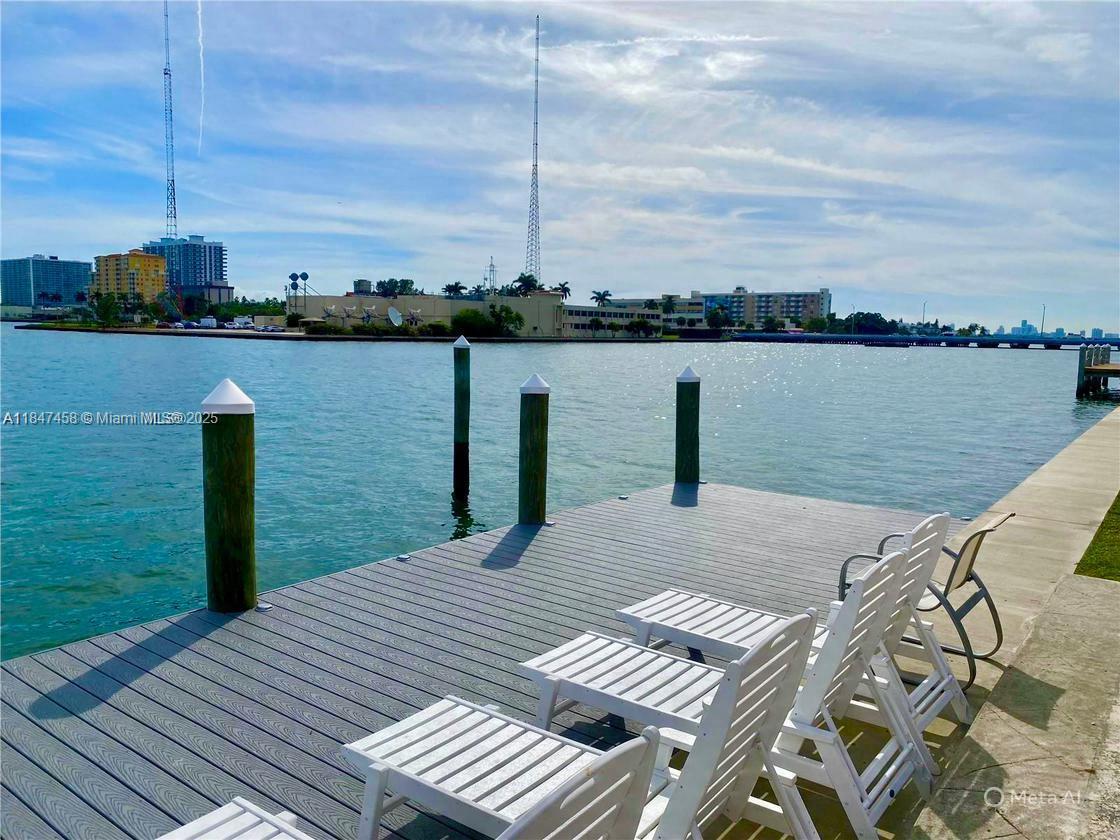 Waterfront building overlooking Biscayne Bay. This Quiet Top-Floor 1/1 apartment has Newly Renovated Kitchen with Gas Range and Remodeled Bath. Feel like your on vacation in this Secluded Garden Style Complex blessed with amazing Sunrises and Sunsets from the newly Renovated Pool & Dock with BBQ and Kayaks.