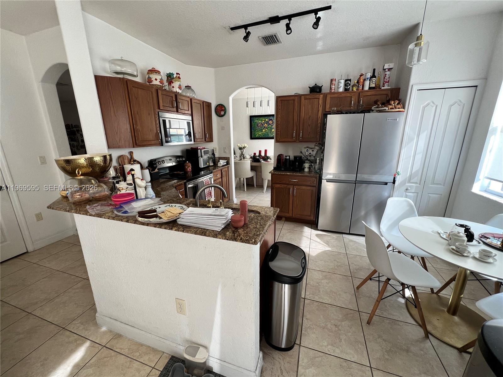 ISLANDS AT DORAL TOWNHOME - Residential