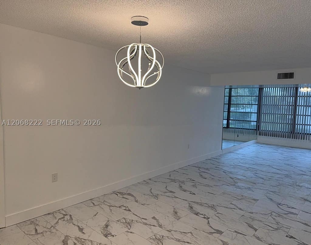 Photo of 3526 Whitehall Dr #302, West Palm Beach, FL 33401 (MLS # A12068222)