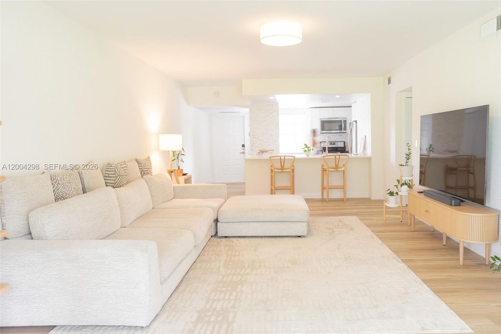 Photo of 3250 N Palm Aire Dr #202, Pompano Beach, FL 33069 (MLS # A12004298)