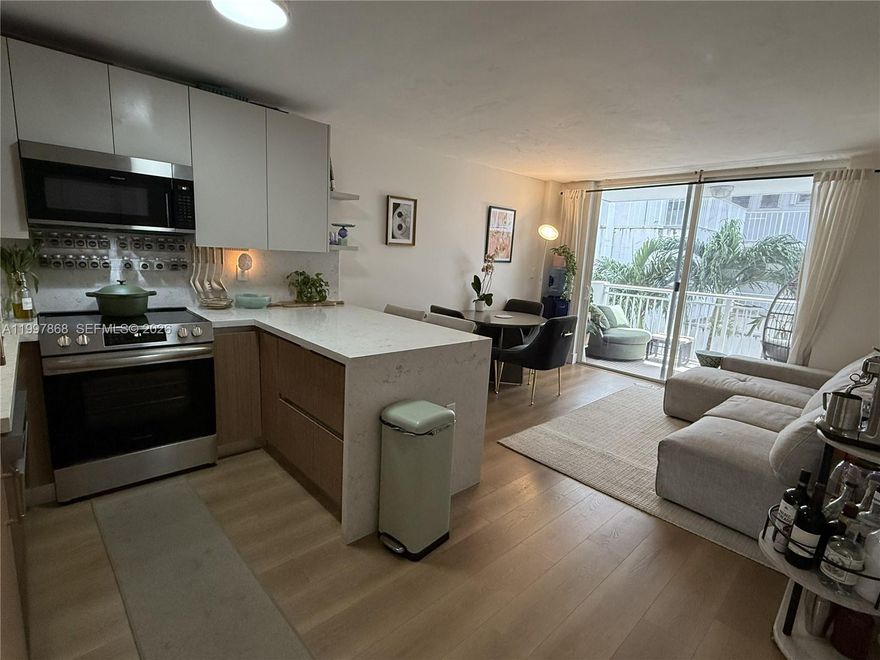 Ideal SoBe location. 2bed/2bath at West Bay Gardens condo. Recently renovated bathrooms, kitchen cabinets, countertops & dining island. New top of the line appliances + paneled refrigerator offering a seamless styled look.  Premium neutral tone wood flooring, impact windows, central A/C, oversized walk-in closet. Quiet and safest building in the area with Low HOA funded with reserves providing courtyard pool & seating areas, gated covered parking, additional scooter parking, private storage and common laundry rooms with 2 washer/dryers per floor. Located at desired West Ave/Bay- Lincoln Road Rd cul-de-sac next to the new walking bridge to Sunset Harbour/Purdy Ave area, Belle Isle and famous Venetian Islands causeway. Steps to Trader Joes and Lincoln Road mall promenade to the ocean.