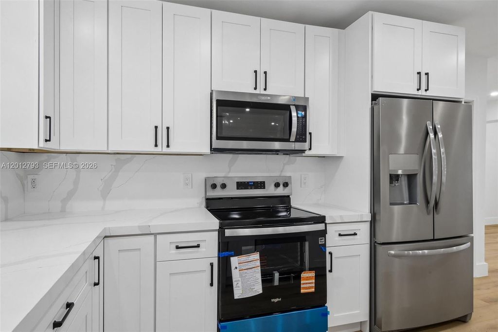 Photo of 4948 SW 90th Ter, Cooper City, FL 33328 (MLS # A12012793)