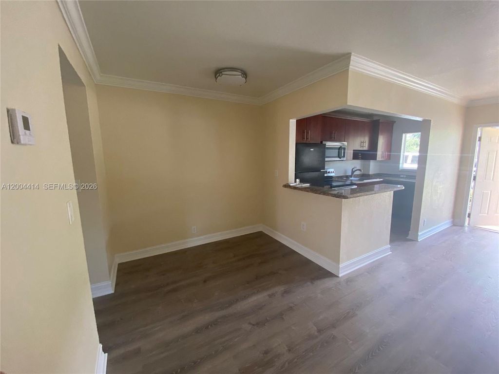 Photo of 1400 NE 56th St #111, Fort Lauderdale, FL 33334 (MLS # A12004414)