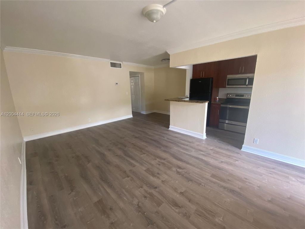 Photo of 1400 NE 56th St #111, Fort Lauderdale, FL 33334 (MLS # A12004414)