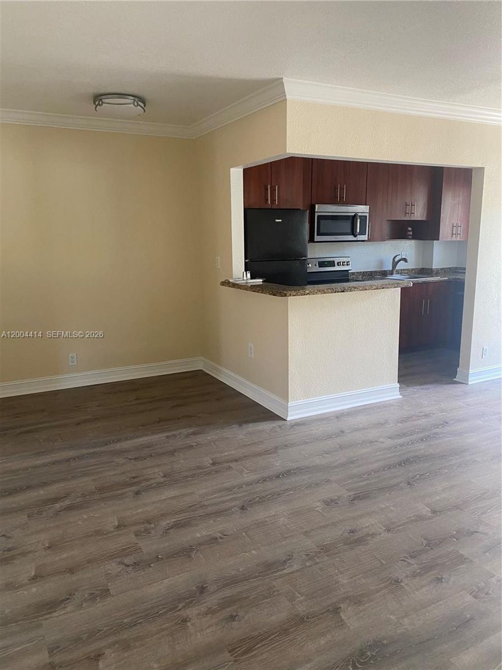 Photo of 1400 NE 56th St #111, Fort Lauderdale, FL 33334 (MLS # A12004414)