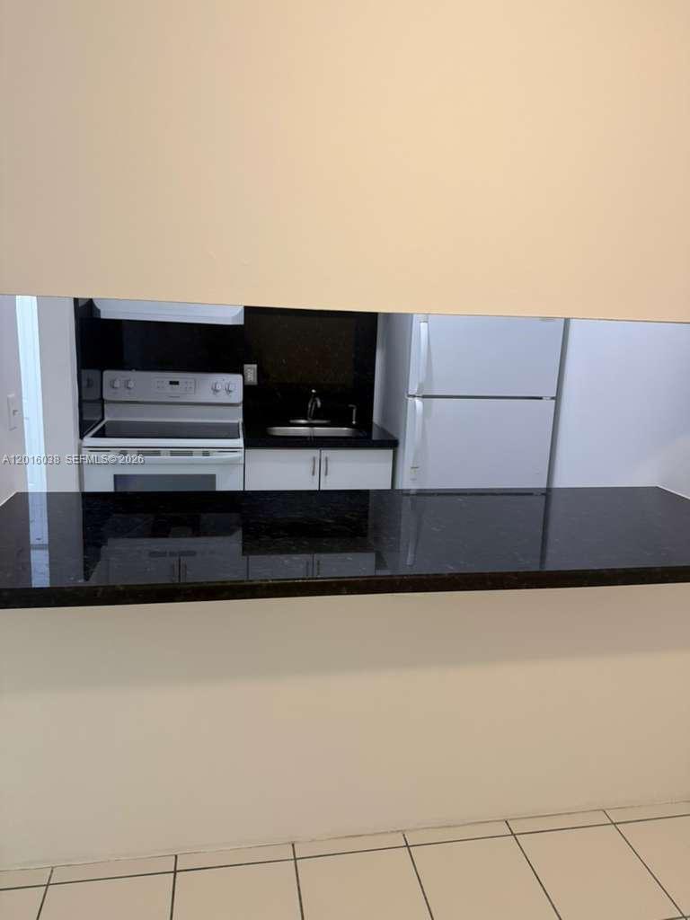 NEW WORLD CONDO APTS III - Residential Lease