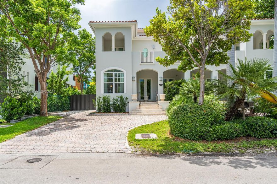 Welcome to this beautifully renovated 3BR/2.5BA beachy townhouse in Key Biscayne. This elevated house features high ceilings, terraces off every bedroom, and a rooftop terrace perfect for sunset views. The coastal-inspired design extends to the private backyard with a saltwater pool, outdoor shower, and plumbing/electric setup for a cold plunge—perfect after a beach day and fun for all ages. The home boasts a renovated kitchen, impact windows, motorized blackout shades in the bedrooms, and linen curtains throughout. Just steps from Village Green, top schools, and shopping, this is island living at its finest! *Key Biscayne Beach Club Membership Included.