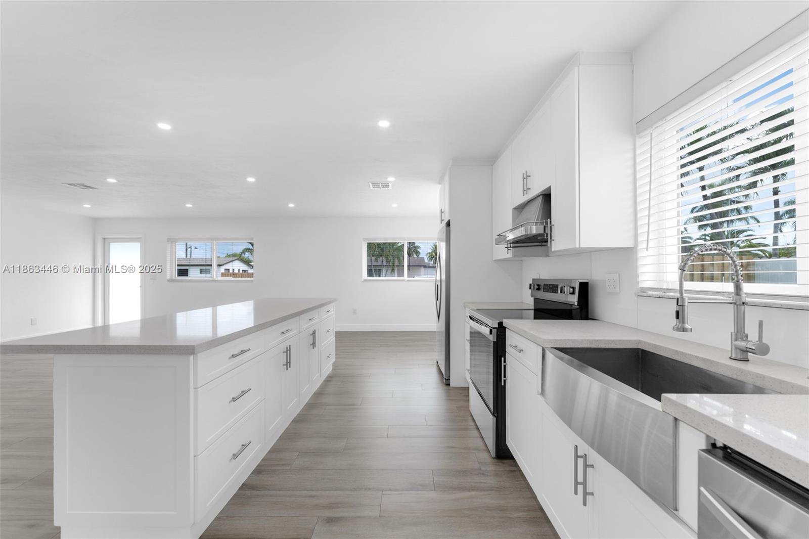 Welcome to this beautifully renovated 3 bed, 3 bath home with over 1,900 square feet of living space plus a detached extra room. This home features brand new stainless steel appliances, open concept kitchen and living area, oversized master bedroom with generous walk-in closet, all impact doors and windows, recessed lighting throughout, Nest thermostat, new washer/dryer, and custom blinds. Enjoy a spacious fenced backyard with covered patio, plenty of parking, and regular landscaping included in the rent. The main house offers 3 bedrooms and 2 baths, while the detached extra room includes its own bath and kitchenette—perfect for an office, guest space, or studio. Centrally located right near main highways, dining, and shopping.