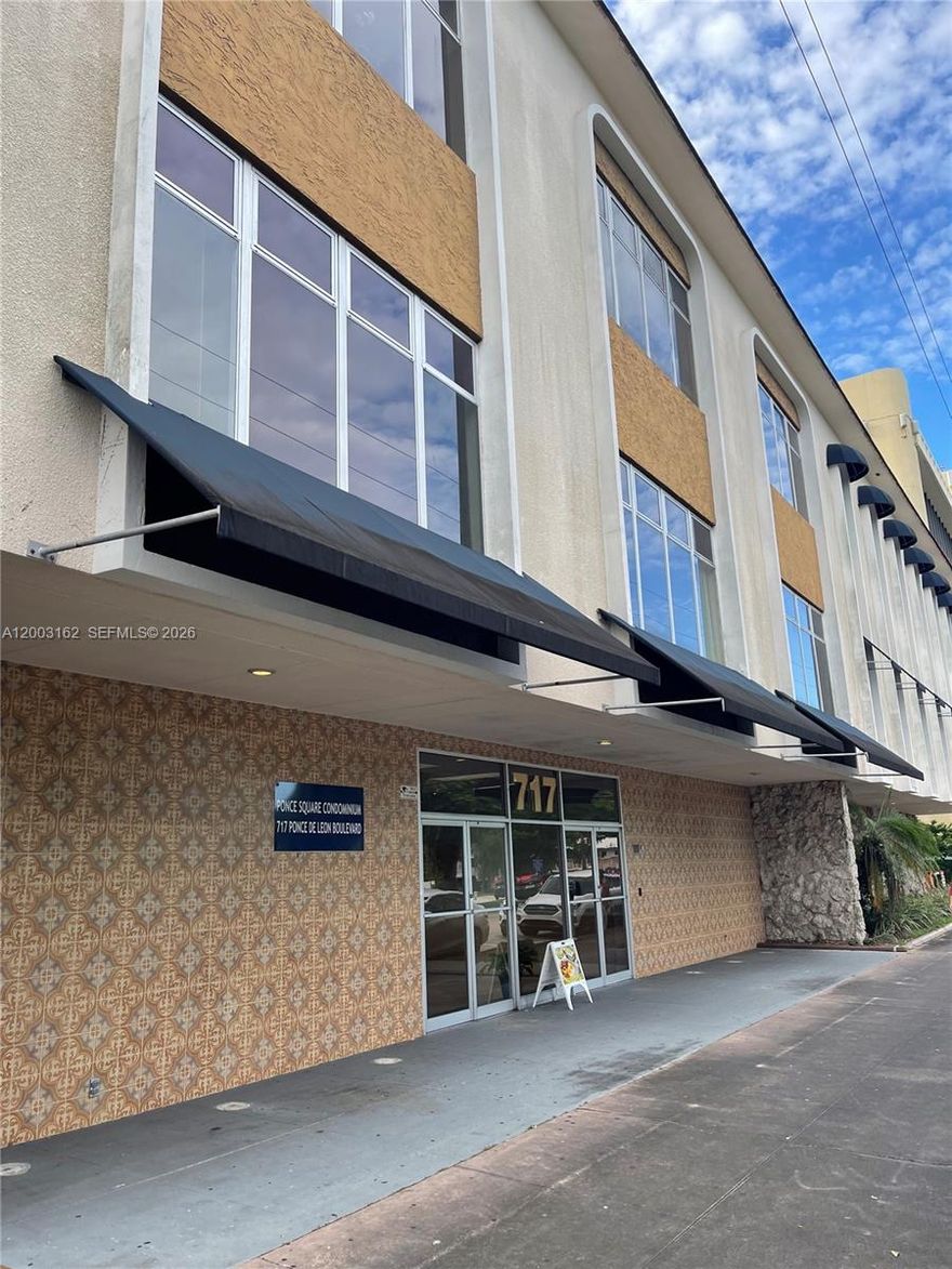 Duplex-style office condominium comprising of two units, offering flexibility to operate as a single combined space or as two independent units, each with its own mailing address. Ideal for a small or growing professional firm, with the option to occupy one unit and lease the other for additional income. Association fees include electricity, water, and exterior maintenance. The property features covered, gated parking and convenient access to Coral Gables amenities, including a trolley stop located directly in front of the building.