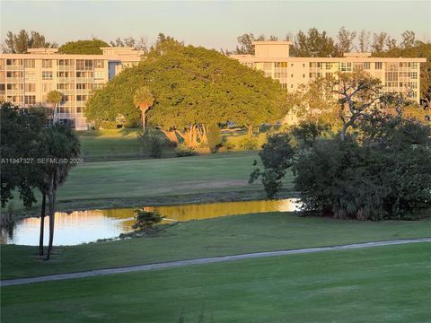 Photo of 2851 S Palm Aire Dr #506, Pompano Beach, FL 33069 (MLS # A11947327)