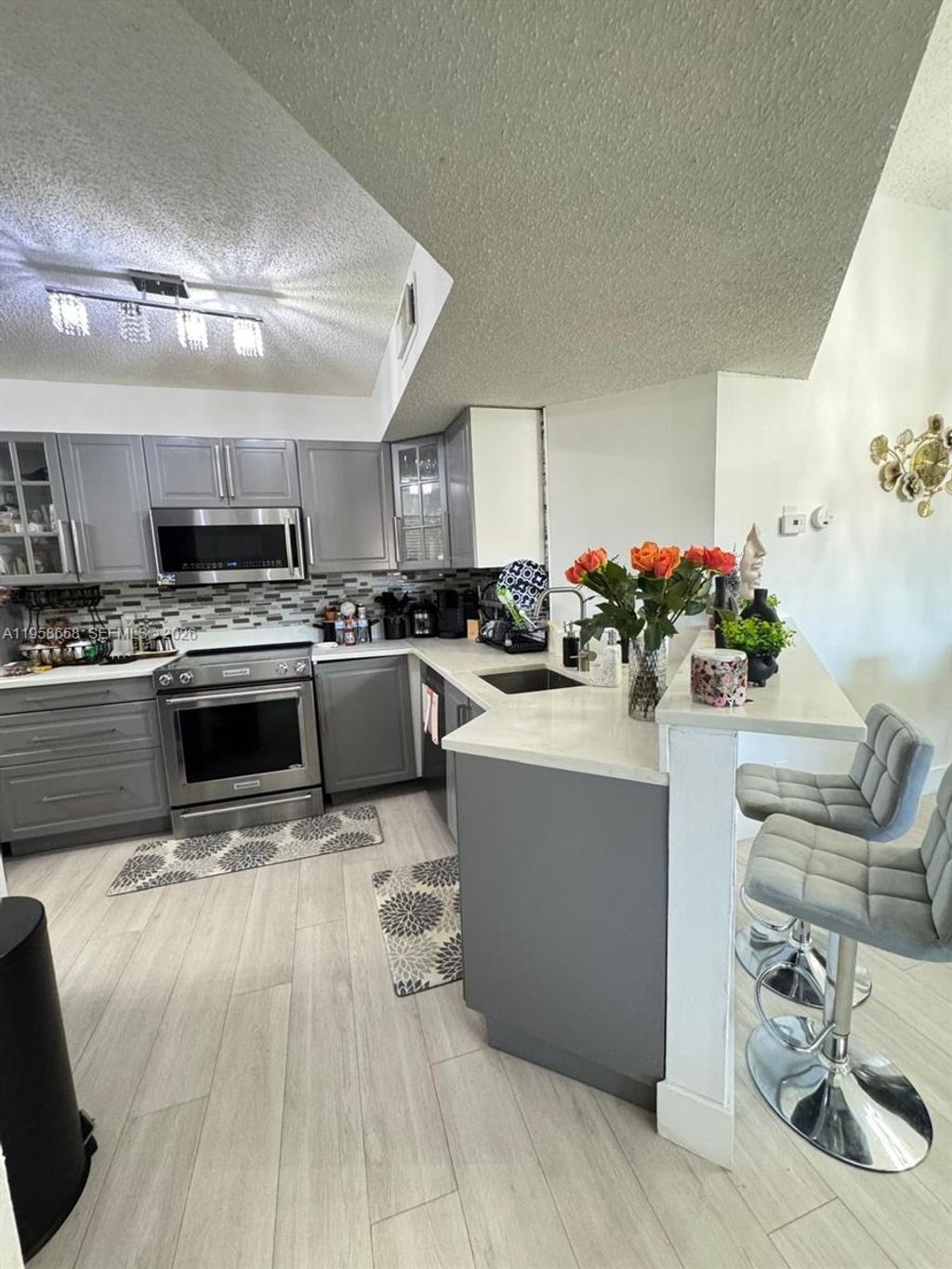 Photo of 8801 Wiles Rd #308, Coral Springs, FL 33067 (MLS # A11958658)