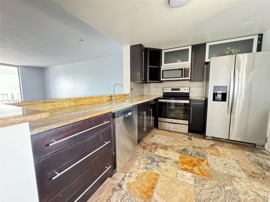 Photo of 900 NE 12th Ave #501, Hallandale Beach, FL 33009 (MLS # A11627945)