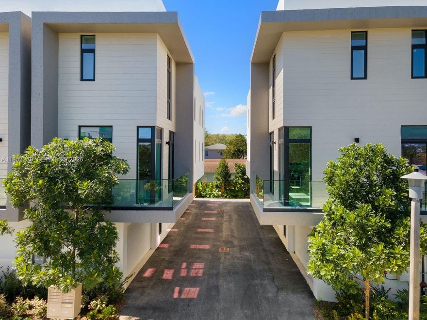 Welcome to Caliza Townhomes – a boutique collection of newly constructed, modern residences located in the
heart of Silver Grove, just minutes from Coconut Grove, Coral Gables, Brickell, and Downtown Miami. This
stunning 3-bedroom, 3-bathroom townhome spans over 2,000 square feet across three thoughtfully designed
levels. The entry-level offers a private 2-car garage, laundry, storage, and a spacious foyer. Upstairs, enjoy a
bright open-concept living space with soaring ceilings, kitchen with high-end appliances, and a private balcony
perfect for morning coffee. Retreat to the third-floor primary suite featuring a luxurious en-suite bathroom, walk-in
closet, and access to your own private rooftop terrace – ideal for entertaining.