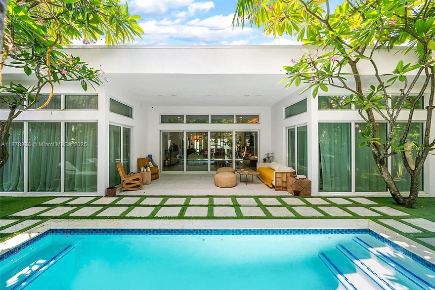 Now available for purchase in Miami Beach! Must see stunning, fully renovated and tenderly restored one-story home. Features include 5 bed, 5 bath, 3,024 sf house, 7,469 sf lot, impact glass, dining room, eat-in kitchen with natural gas, staff kitchen, skylights, living room/media room, circular driveway, covered exterior terrace, heated swimming pool, outdoor shower, summer kitchen with BBQ and fridge and lush landscaping. Prime location.