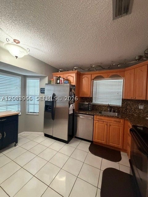 Photo of 10726 NW 11th St, Pembroke Pines, FL 33026 (MLS # A12083966)