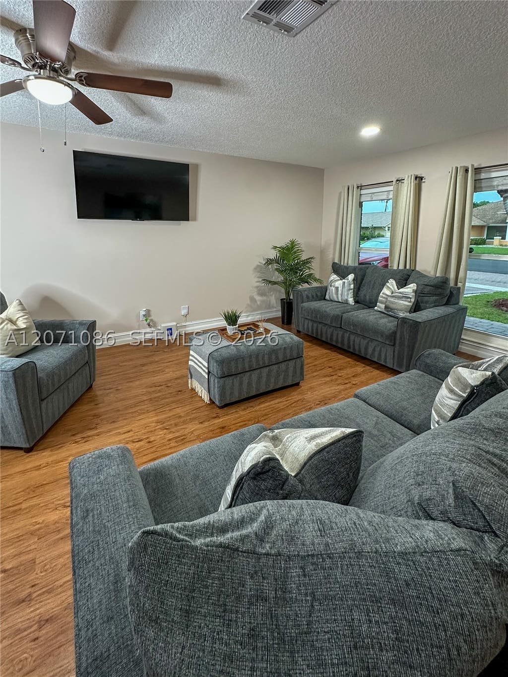 Photo of 177 Dove Cir, Royal Palm Beach, FL 33411 (MLS # A12071086)