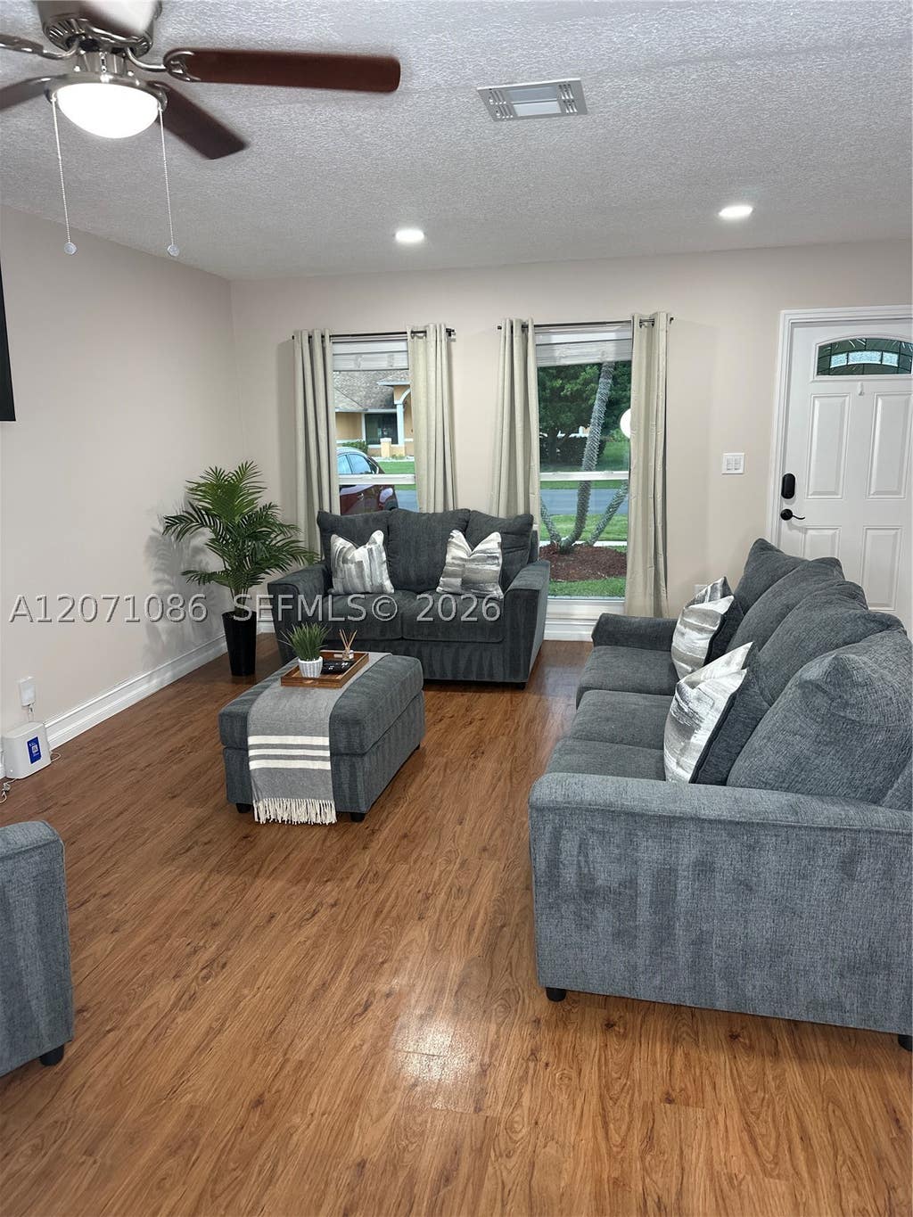 Photo of 177 Dove Cir, Royal Palm Beach, FL 33411 (MLS # A12071086)