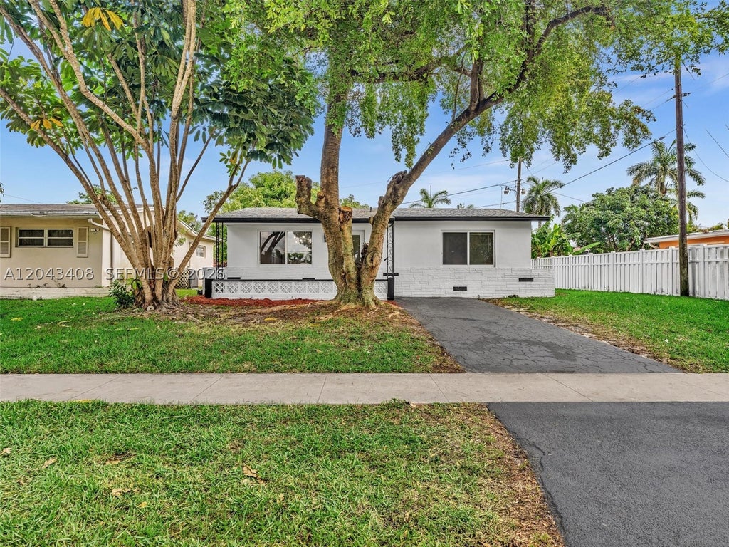 Photo of 8145 Sunset Strip, Sunrise, FL 33322 (MLS # A12043408)