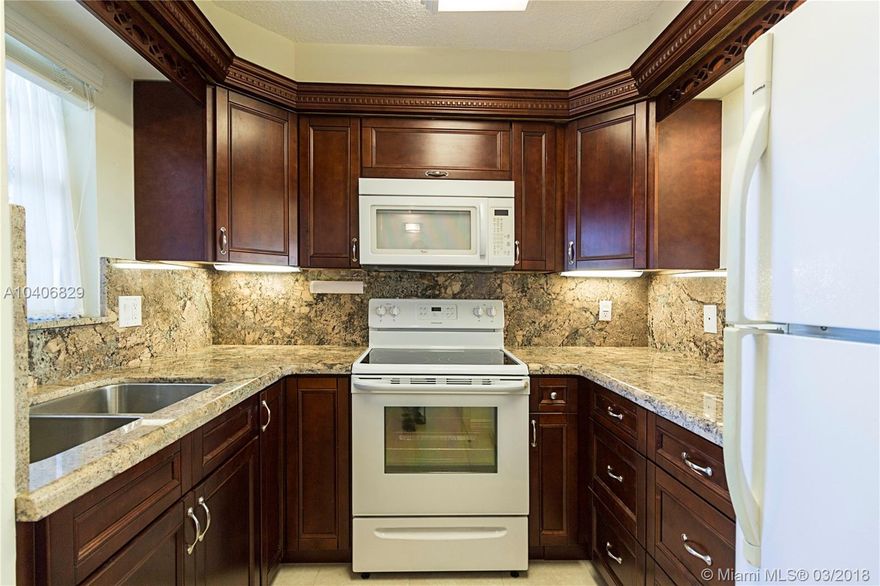 PRICED TO SELL!!! 55+ updated 1/1 first floor condo in east Boca! Updated Beautiful Kitchen and bathroom, Walk-In Closet, Extra Storage Low maintenance and NO mandatory membership!  Additional office space with beautiful garden view, laundry facilties.  Close to assigned parking space. Lots of amenities: pool, clubhouse, billiards, shuffle board, BBQ area and car wash station.  Close to grocery stores, malls, interstates and restaurants! Lively community!  Come enjoy your retirement in this lively community!