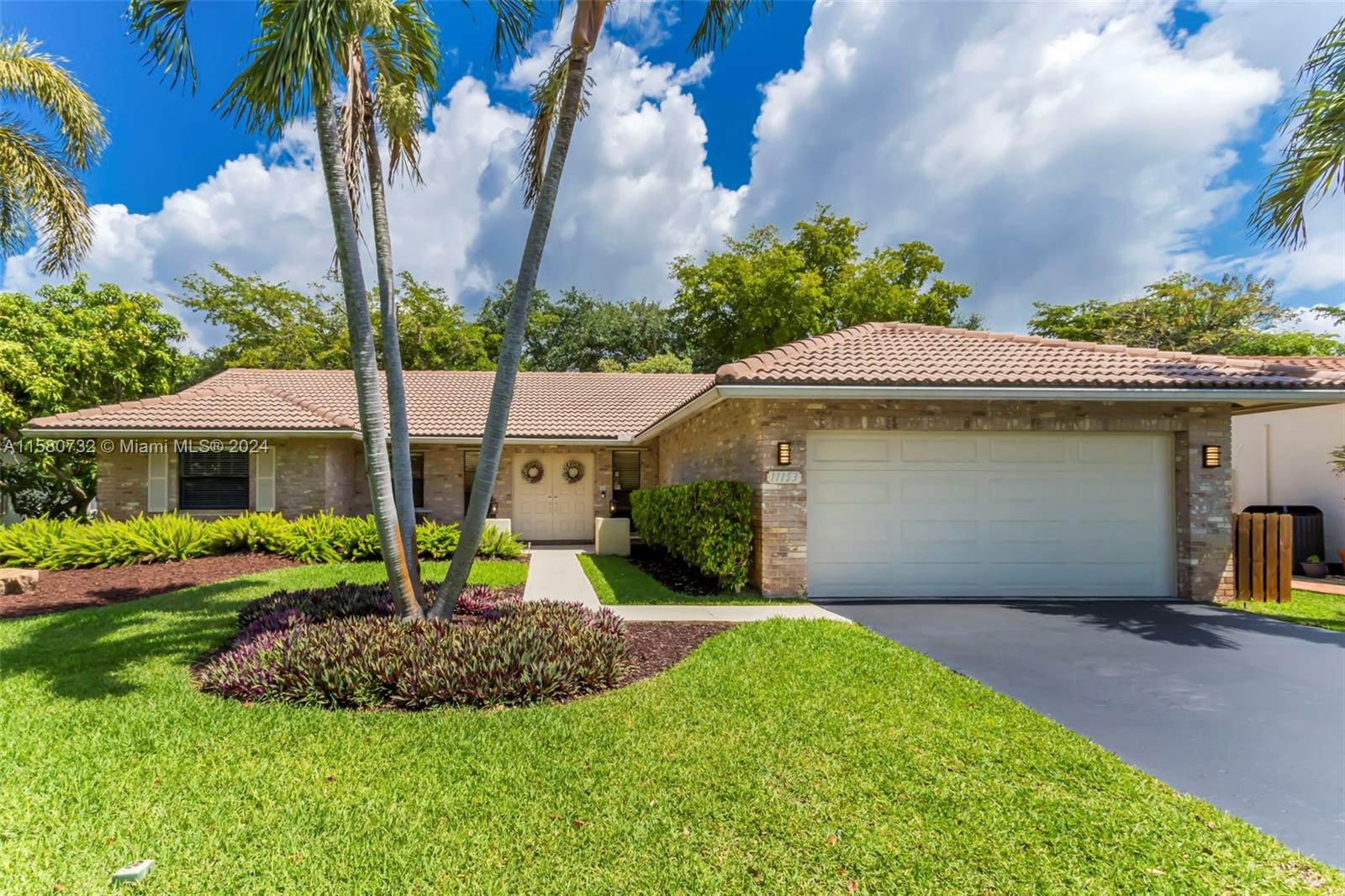 Impeccable one story 3 bedroom 2 bath ranch style home with a large pool located in the sought out community of Cypress Glen in Coral Springs! The kitchen is complete with wood cabinetry, stainless steel appliances, granite counter tops and breakfast area. The bathrooms were completely renovated with brand new vanities, bathtub, modern lighting and tile floors. This renovated home features porcelain tile floors throughout all living areas and luxury vinyl floors in bedrooms. The backyard has a huge grassy yard on both sides of the house. Beautifully maintained garden with large pool and covered sitting area. Backyard is completely fenced-in and very private. This home is protected by accordion shutters.