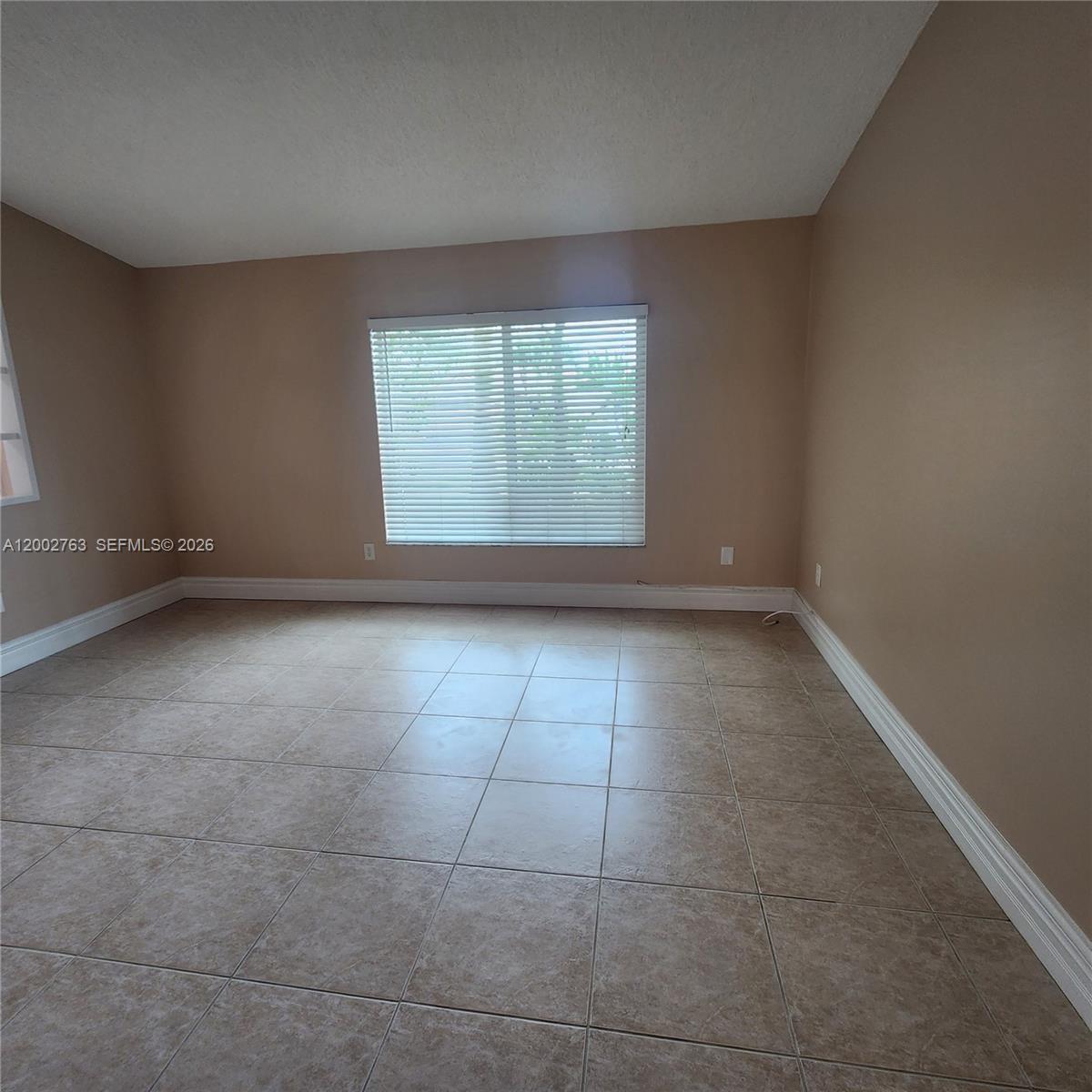 FLAMINGO GARDENS-PHASE TW - Residential Lease