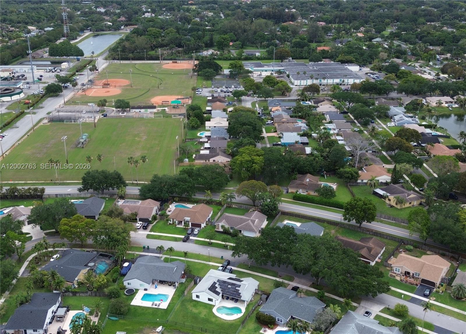 FLAMINGO GARDENS-PHASE TW - Residential Lease