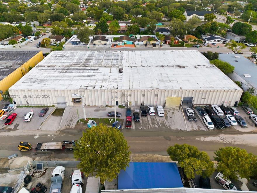 2275 NW 150th Street is a 46,986 SF multi-tenant industrial warehouse situated on a 60,113 SF (1.38 AC) lot in the City of Opa-locka. The property is constructed of reinforced concrete making it suitable for a wide range of industrial, logistics, and owner-user or investor use cases.

The building offers both dock-high and grade-level loading at the front and rear of the property, with a total of six loading doors, including multiple truck wells and oversized drive-in access. Clear ceiling height measures approximately 23’8” with a twin-T roof system, and column spacing is well-suited for efficient warehouse layouts. The property is equipped with heavy 400-amp, 3-phase power and dry sprinkler system.

Zoned IU-1 (Opa-locka), the site supports a variety of industrial uses and benefits from city sewer service and location outside the wellfield. The property is located approximately one mile east of the Opa-locka Airport with convenient access to major transportation corridors. The existing electrical configuration allows for the building to be easily demised into multiple bays, supporting flexible leasing strategies.