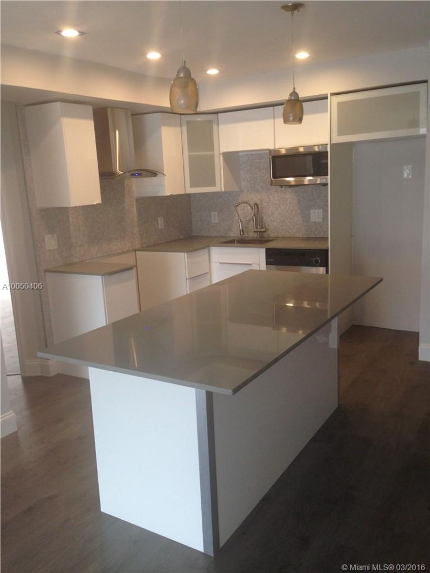 "25% down mortgage & cash only" $10,000 CASH BACK AT CLOSING (with full price offer) NEW EVERYTHING! 2BED + DEN condo in beautiful Eastern Shores. Water view with private balcony. Brand NEW open concept kitchen with high end white gloss cabinets, huge island and gray marble counters. Recessed LED ceiling lights throughout.  New master bathroom with spa rain shower and floating vanity. Gorgeous new laminate floors throughout.  Tile in bathrooms. All new fixtures.$289 HOA fee. Quiet building with newer pool