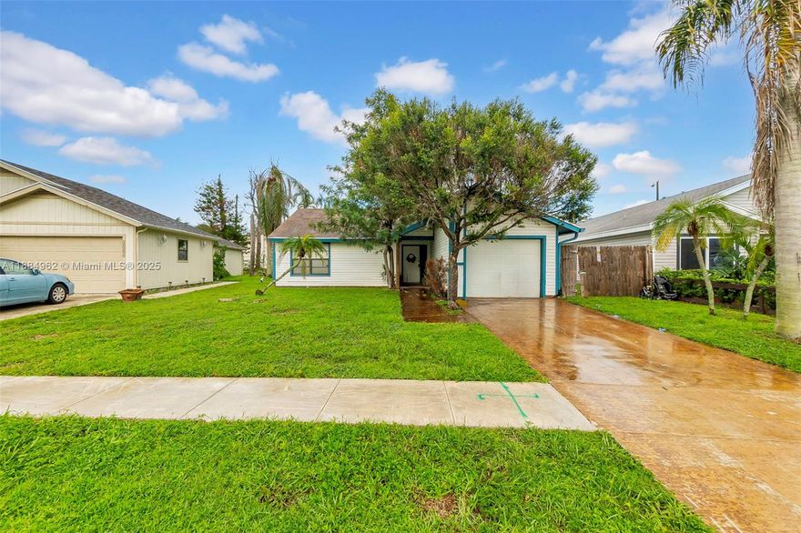 Single family home located in the Lakeside Green community in the heart of West Palm Beach. This home features 2 ample bedrooms, 1.5 bathrooms, 1 car garage with beautiful high ceilings and real wood and tile flooring throughout. Outdoors, enjoy the long driveway and fenced is yard that provide room for a pool and lots of entertainment space. Low association fee of $170 a month, which includes cable, community pool and gym. Centrally located near major highways and lots of shopping and dining options.