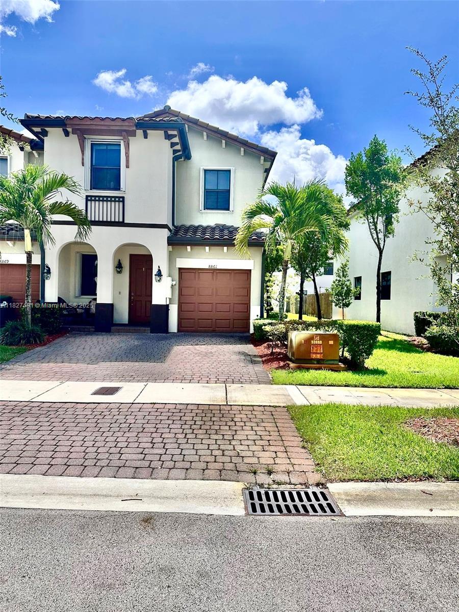 Spacious Corner Townhouse 4-bed, 3-bath in Gated Community, this 2-story residence offers 1,870 sqft