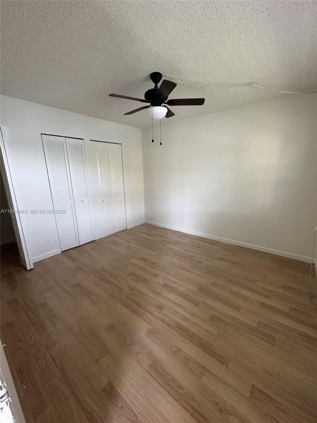 Photo of 10003 Winding Lake Rd #103, Sunrise, FL 33351 (MLS # A11994662)