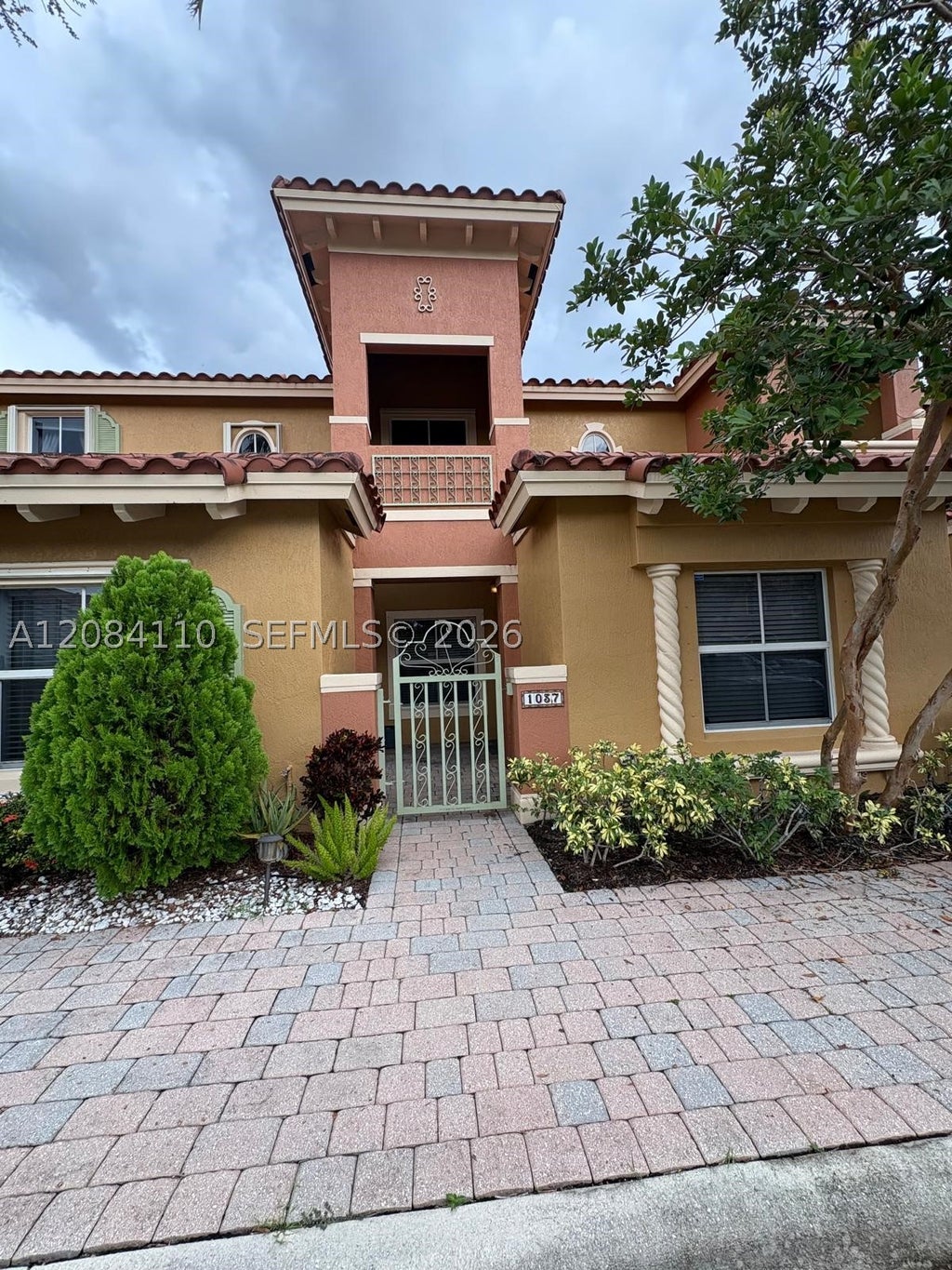 Photo of 1037 SW 143rd Ave #1305, Pembroke Pines, FL 33027 (MLS # A12084110)