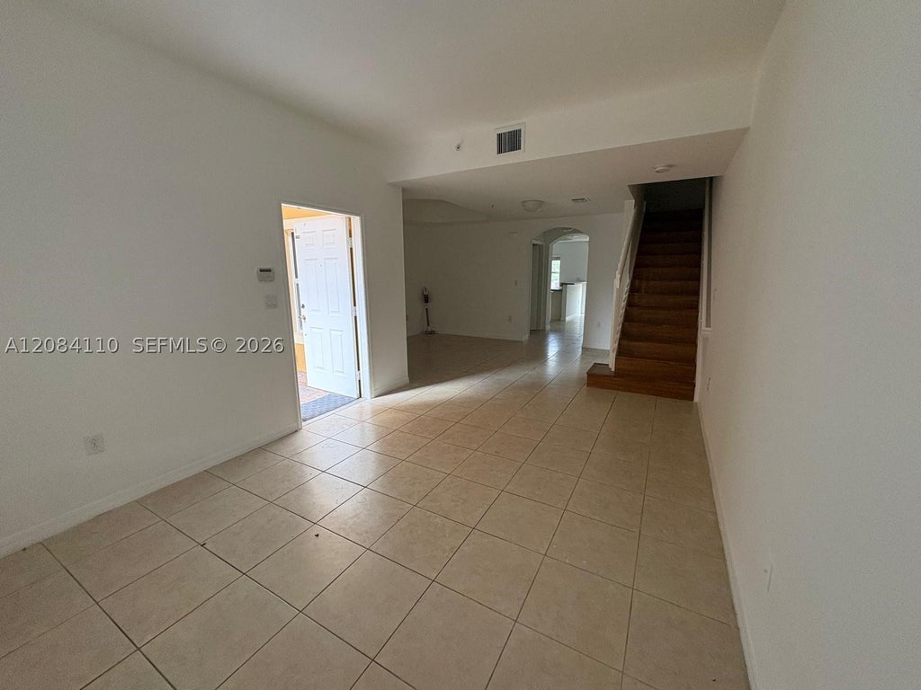Photo of 1037 SW 143rd Ave #1305, Pembroke Pines, FL 33027 (MLS # A12084110)