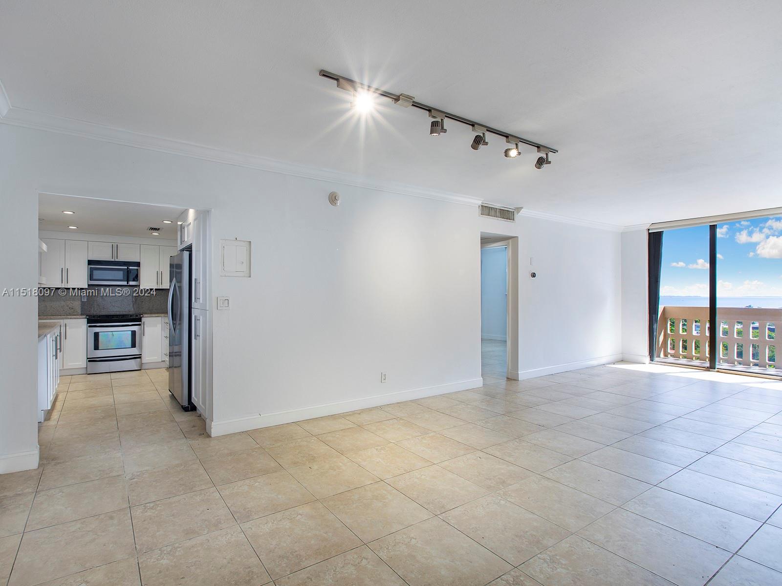 Immediately feel relaxed and at home when you step into this 910sq. ft. spacious floor plan with views of biscayne bay from the moment you open the door. The unit has tile floors, sliding glass balcony doors and a relaxing, cozy appeal. The unit received a full make over in 2018 having both bathrooms remodeled, the AC unit was replaced, the kitchen was re-finished and the entire apt received a fresh coat of white paint. Minutes away from the amenities of coconut grove while receiving the safe luxuries of Coral Gables. Gables Waterway Towers has a pool, gym, 24 hour security, a 24hour doorman, valet parking and a parking spot per unit. Boat dockage can be made available upon request.