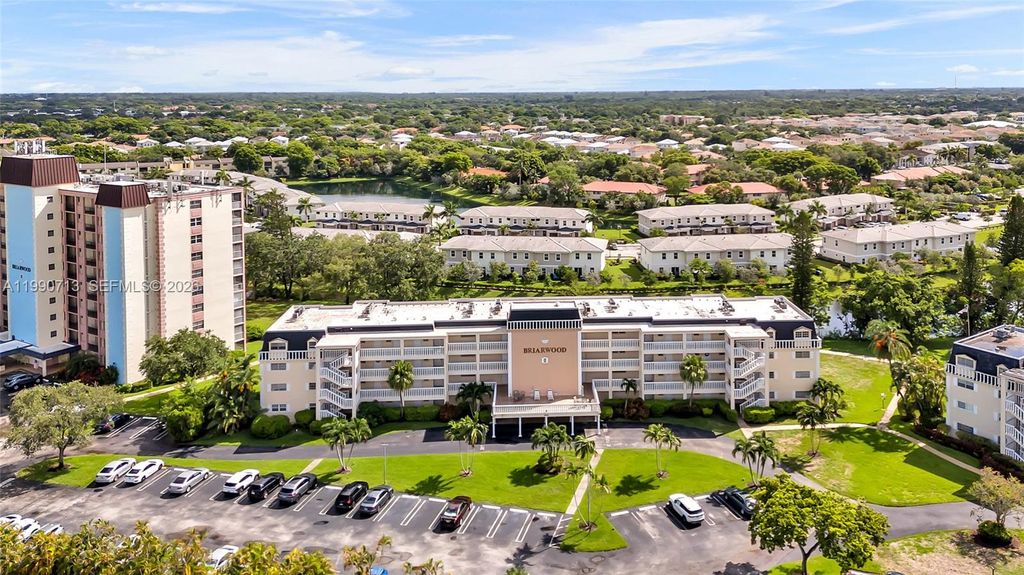 Photo of 3535 Broken Woods Dr #302, Coral Springs, FL 33065 (MLS # A11990713)